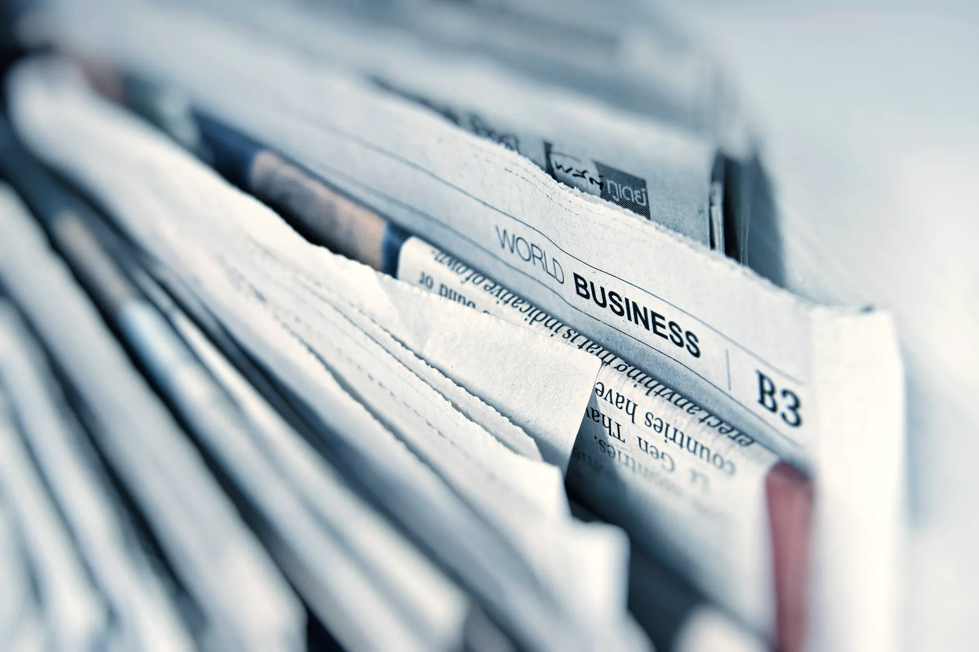 Folded business newspapers